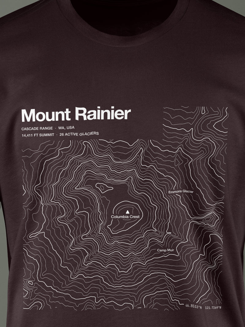 Topographic contour t-shirt of Mount Rainier, Cascade Range, Washington, 14,411 ft with 26 active glaciers, rendered from USGS 3DEP elevation data. Cotton contour-art tee by Horizon Editions - real terrain, hand-drawn, no AI.